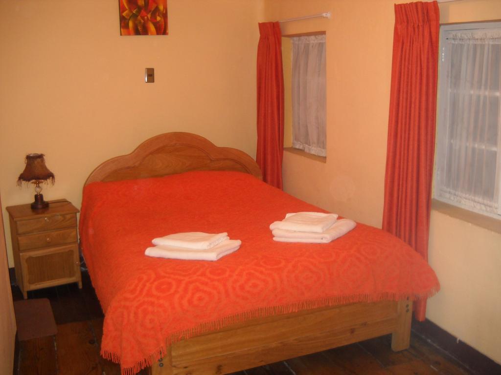 Hostal Isidoros - Terminal De Buses La Paz Room photo
